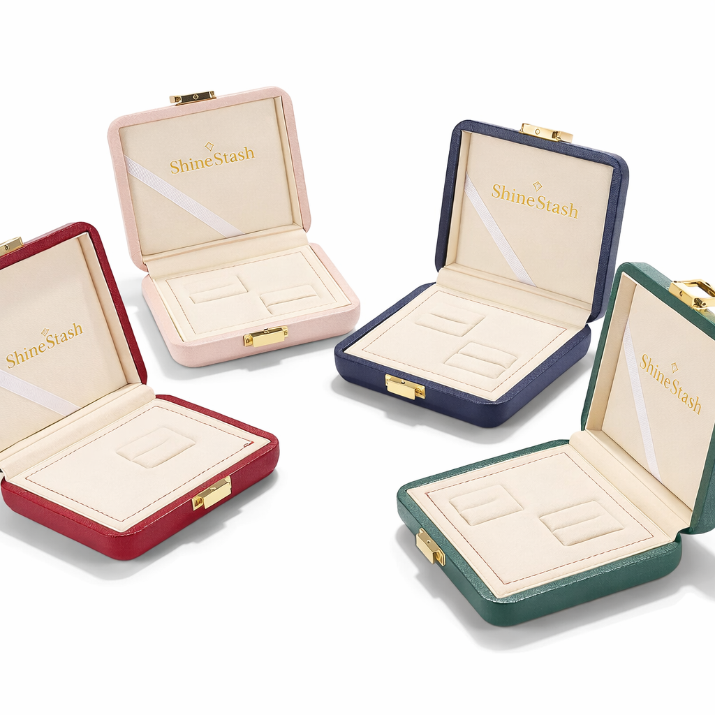 ShineStash luxury jewelry box packaging collection in multiple colors, open display with gold logo and inserts